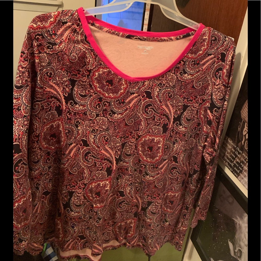 Kim Rogers pink shirt